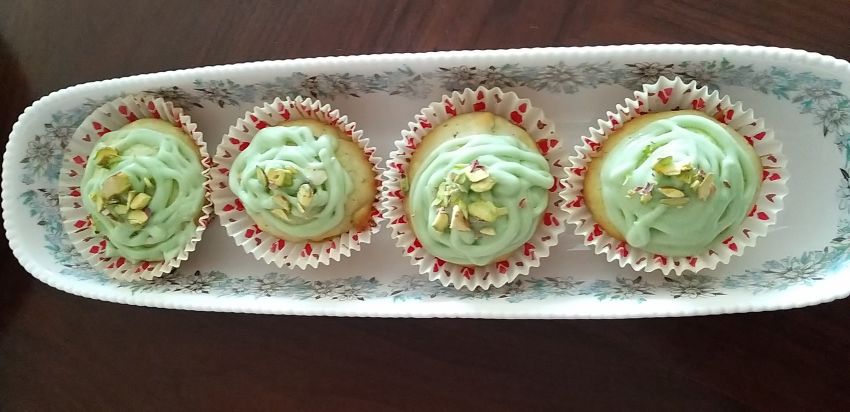 Pistachio cupcakes with frosting 
