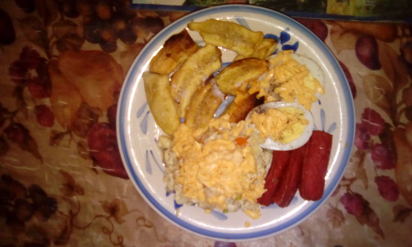 Boiled & scrambled eggs w/cheese and fried sausage & banana chips